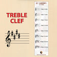 A treble clef key signature bookmark and a large treble clef on a staff