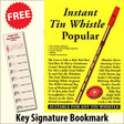 front cover of Instant Tin Whistle Popular Book/CD together with free Treble Clef bookmark