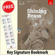 front cover of ABRSM Shining Brass Book 2 F Piano Accompaniment together with free Piano Clef bookmark