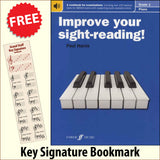 front cover of Improve Your Sight-Reading Piano Grade 1 together with free Piano Clef bookmark