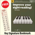 front cover of Improve Your Sight-Reading Piano Grade 7 together with free Piano Clef bookmark