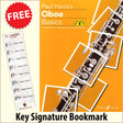 front cover of Paul Harris's Oboe Basics together with free Treble Clef bookmark