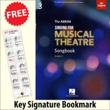 front cover of The ABRSM Singing for Musical Theatre Songbook Grade 3 together with free Grand Staff bookmark