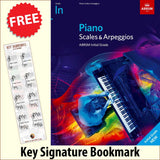 front cover of ABRSM Piano Scales Arpeggios Initial Grade together with free Piano Clef bookmark